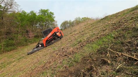 skid steer for mowing hilly terrain|slope mowing for tractors.